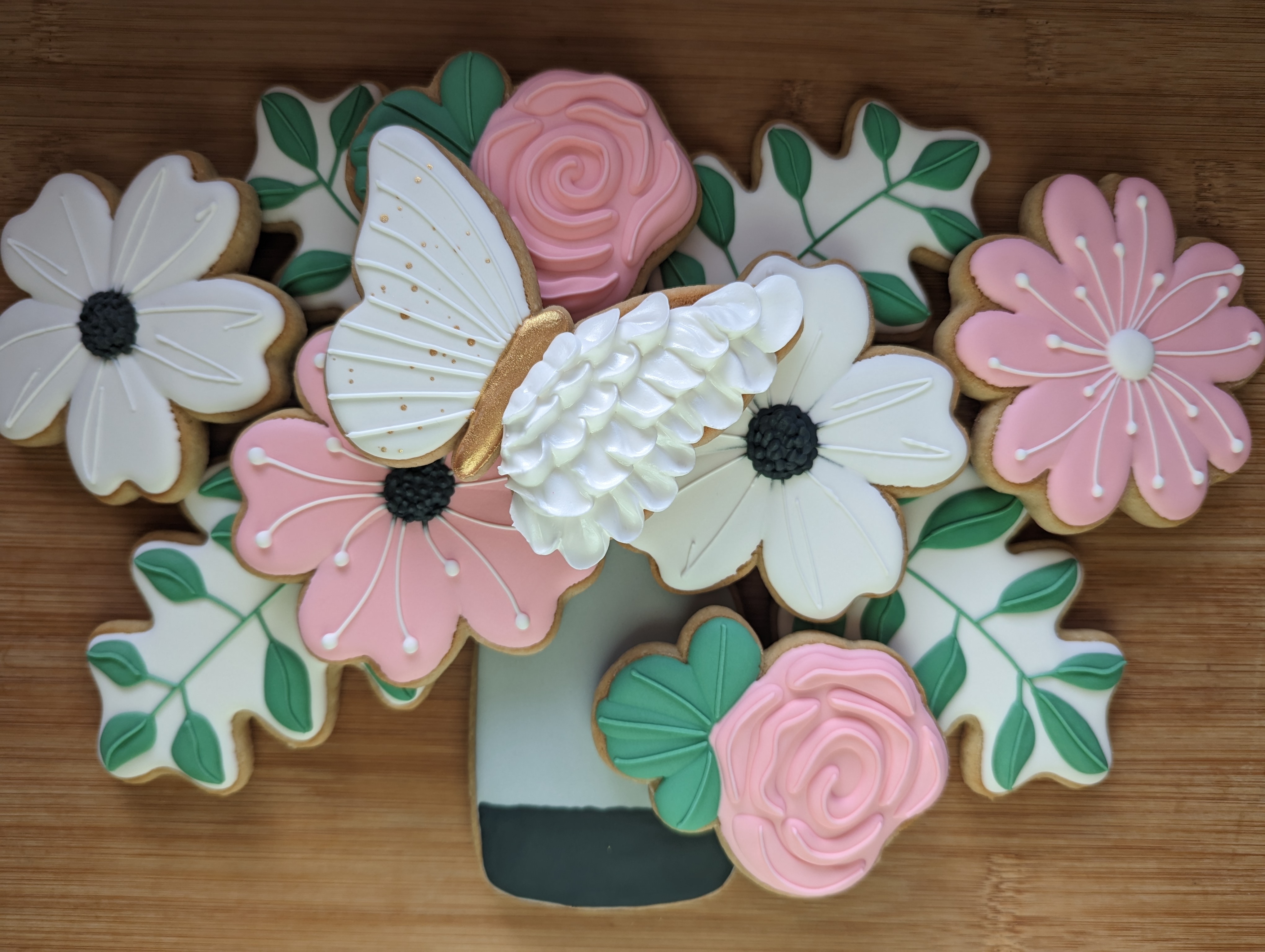 Hand-decorated butterfly bouquet sugar cookies